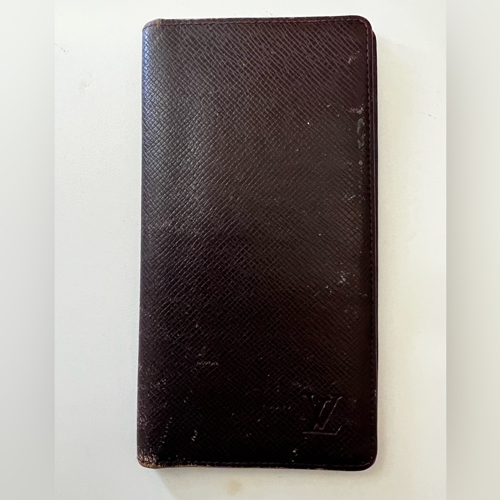 - LOUIS VUITTON burgundy tiaga leather wallet